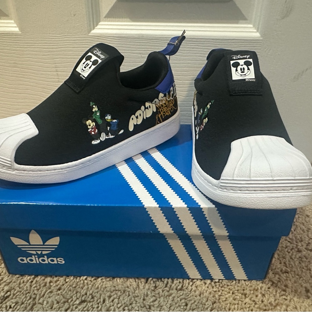 Adidas Black and White Slip-On Sneakers